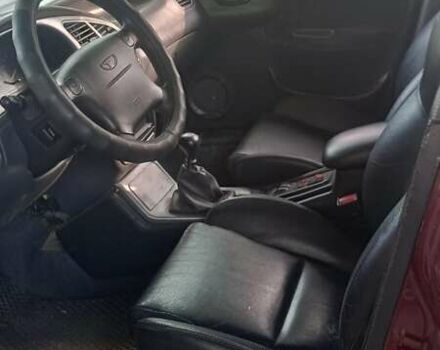 Красный Дэу Ланос, объемом двигателя 1.5 л и пробегом 182 тыс. км за 3100 $, фото 5 на Automoto.ua