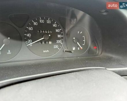 Красный Дэу Ланос, объемом двигателя 1.5 л и пробегом 135 тыс. км за 2450 $, фото 2 на Automoto.ua