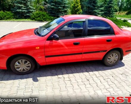 Красный Дэу Ланос, объемом двигателя 1.5 л и пробегом 158 тыс. км за 3500 $, фото 4 на Automoto.ua