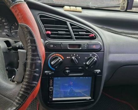 Красный Дэу Ланос, объемом двигателя 1.5 л и пробегом 211 тыс. км за 2800 $, фото 8 на Automoto.ua