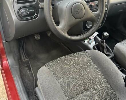 Красный Дэу Ланос, объемом двигателя 1.5 л и пробегом 211 тыс. км за 2900 $, фото 8 на Automoto.ua