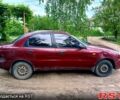 Красный Дэу Ланос, объемом двигателя 1.5 л и пробегом 261 тыс. км за 1400 $, фото 2 на Automoto.ua