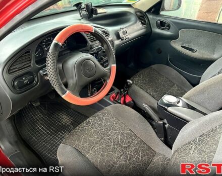 Дэу Ланос 2008 в Краснокутске на Automoto.ua Красный Дэу Ланос, объемом двигателя 1.4 л и пробегом 170 тыс. км за 1800 $, фото 3 на Automoto.ua