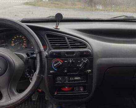 Красный Дэу Ланос, объемом двигателя 1.5 л и пробегом 270 тыс. км за 2200 $, фото 6 на Automoto.ua