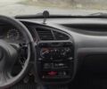 Красный Дэу Ланос, объемом двигателя 1.5 л и пробегом 270 тыс. км за 2200 $, фото 6 на Automoto.ua