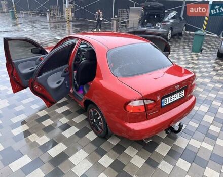 Червоний Деу Ланос, об'ємом двигуна 1.5 л та пробігом 103 тис. км за 3950 $, фото 27 на Automoto.ua