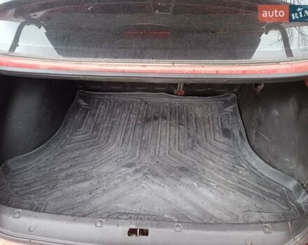 Красный Дэу Ланос, объемом двигателя 1.5 л и пробегом 210 тыс. км за 1800 $, фото 7 на Automoto.ua