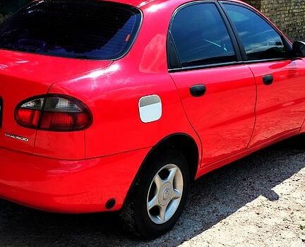 Красный Дэу Ланос, объемом двигателя 1.5 л и пробегом 250 тыс. км за 2550 $, фото 4 на Automoto.ua
