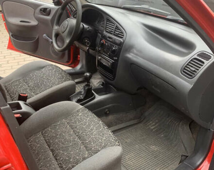 Красный Дэу Ланос, объемом двигателя 1.4 л и пробегом 73 тыс. км за 1750 $, фото 17 на Automoto.ua