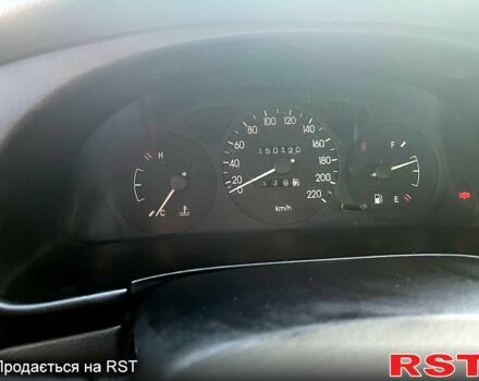 Красный Дэу Ланос, объемом двигателя 1.4 л и пробегом 150 тыс. км за 2700 $, фото 6 на Automoto.ua