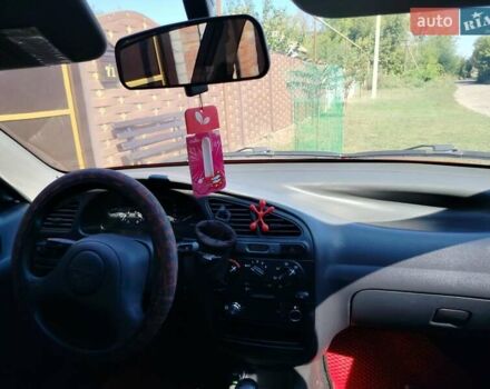 Деу Ланос 2008 у Богодухове на Automoto.ua Червоний Деу Ланос, об'ємом двигуна 1.5 л та пробігом 153 тис. км за 2600 $, фото 15 на Automoto.ua