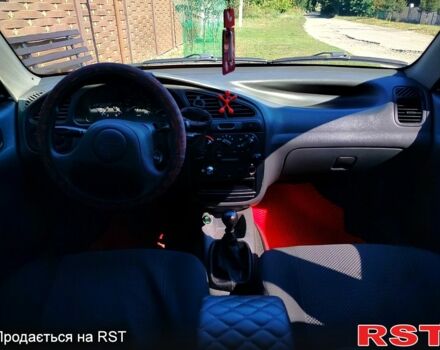 Червоний Деу Ланос, об'ємом двигуна 1.5 л та пробігом 151 тис. км за 2800 $, фото 5 на Automoto.ua