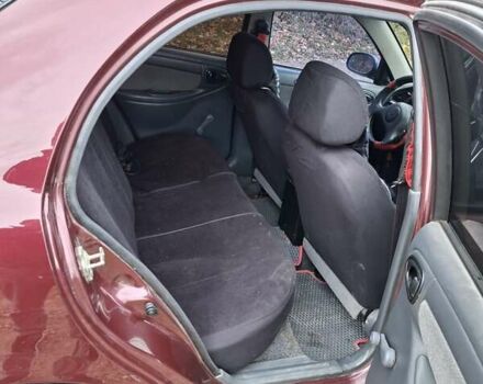 Красный Дэу Ланос, объемом двигателя 1.5 л и пробегом 211 тыс. км за 2800 $, фото 5 на Automoto.ua