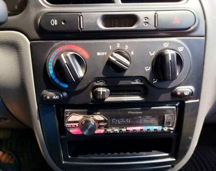 Красный Дэу Ланос, объемом двигателя 1.5 л и пробегом 158 тыс. км за 3500 $, фото 3 на Automoto.ua