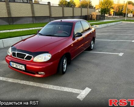Красный Дэу Ланос, объемом двигателя 1.4 л и пробегом 150 тыс. км за 2700 $, фото 3 на Automoto.ua