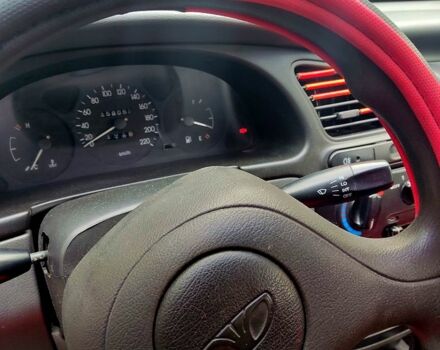 Деу Ланос 2008 у Харкові на Automoto.ua Червоний Деу Ланос, об'ємом двигуна 1.4 л та пробігом 157 тис. км за 2000 $, фото 11 на Automoto.ua