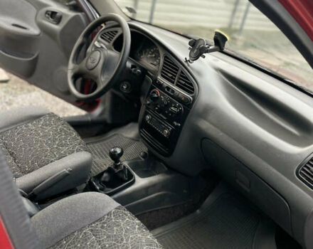 Красный Дэу Ланос, объемом двигателя 1.5 л и пробегом 285 тыс. км за 2600 $, фото 14 на Automoto.ua