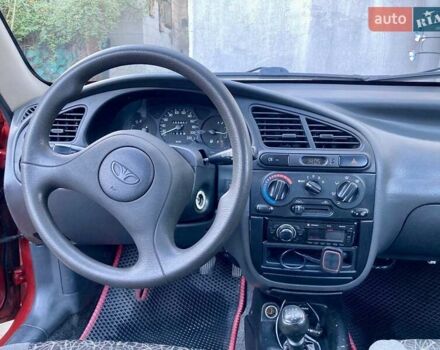 Красный Дэу Ланос, объемом двигателя 1.4 л и пробегом 103 тыс. км за 2700 $, фото 4 на Automoto.ua