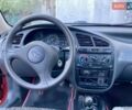 Красный Дэу Ланос, объемом двигателя 1.4 л и пробегом 103 тыс. км за 2700 $, фото 4 на Automoto.ua