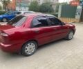 Красный Дэу Ланос, объемом двигателя 1.5 л и пробегом 173 тыс. км за 1900 $, фото 1 на Automoto.ua