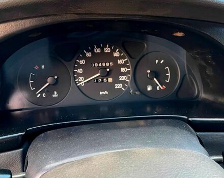 Красный Дэу Ланос, объемом двигателя 1.4 л и пробегом 95 тыс. км за 1999 $, фото 2 на Automoto.ua