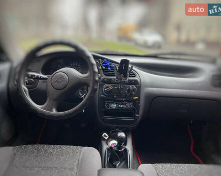 Красный Дэу Ланос, объемом двигателя 1.4 л и пробегом 201 тыс. км за 3200 $, фото 4 на Automoto.ua