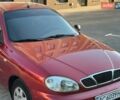 Красный Дэу Ланос, объемом двигателя 1.6 л и пробегом 222 тыс. км за 2000 $, фото 1 на Automoto.ua