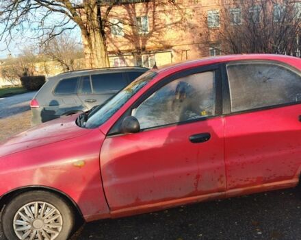 Красный Дэу Ланос, объемом двигателя 1.5 л и пробегом 100 тыс. км за 1500 $, фото 1 на Automoto.ua