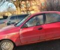 Красный Дэу Ланос, объемом двигателя 1.5 л и пробегом 100 тыс. км за 1500 $, фото 1 на Automoto.ua