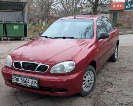 Красный Дэу Ланос, объемом двигателя 1.4 л и пробегом 156 тыс. км за 1950 $, фото 1 на Automoto.ua