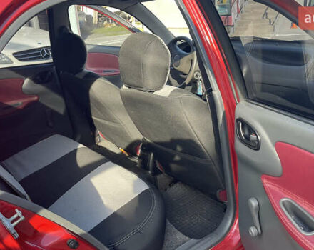 Красный Дэу Ланос, объемом двигателя 1.5 л и пробегом 148 тыс. км за 2600 $, фото 34 на Automoto.ua