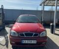 Красный Дэу Ланос, объемом двигателя 1.5 л и пробегом 254 тыс. км за 1999 $, фото 1 на Automoto.ua