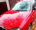 Красный Дэу Ланос, объемом двигателя 1.5 л и пробегом 300 тыс. км за 2000 $, фото 1 на Automoto.ua
