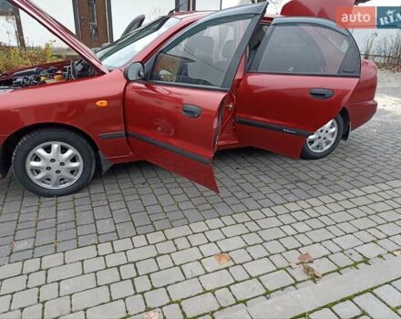 Красный Дэу Ланос, объемом двигателя 15 л и пробегом 170 тыс. км за 2750 $, фото 19 на Automoto.ua