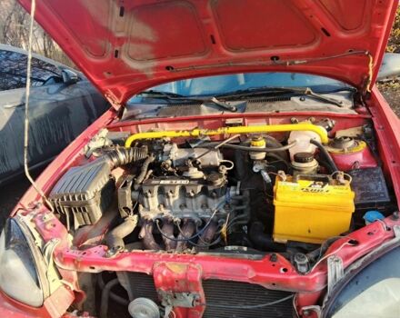 Красный Дэу Ланос, объемом двигателя 1.5 л и пробегом 100 тыс. км за 1500 $, фото 6 на Automoto.ua
