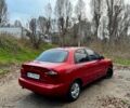 Красный Дэу Ланос, объемом двигателя 1.4 л и пробегом 180 тыс. км за 1400 $, фото 1 на Automoto.ua
