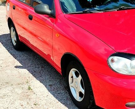 Красный Дэу Ланос, объемом двигателя 1.5 л и пробегом 250 тыс. км за 2550 $, фото 2 на Automoto.ua