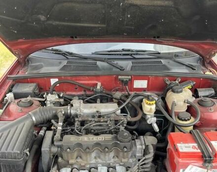 Красный Дэу Ланос, объемом двигателя 1.5 л и пробегом 211 тыс. км за 2900 $, фото 5 на Automoto.ua