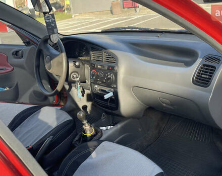 Красный Дэу Ланос, объемом двигателя 1.5 л и пробегом 148 тыс. км за 2600 $, фото 32 на Automoto.ua