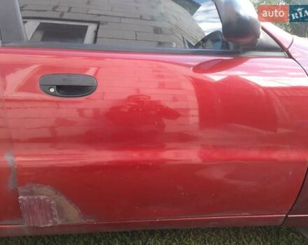 Деу Ланос 2008 у Києві на Automoto.ua Червоний Деу Ланос, об'ємом двигуна 1.5 л та пробігом 180 тис. км за 1400 $, фото 1 на Automoto.ua