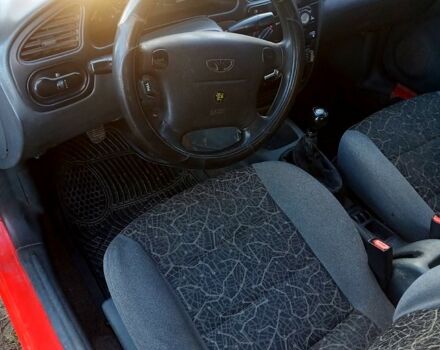 Красный Дэу Ланос, объемом двигателя 1.6 л и пробегом 507 тыс. км за 1300 $, фото 5 на Automoto.ua