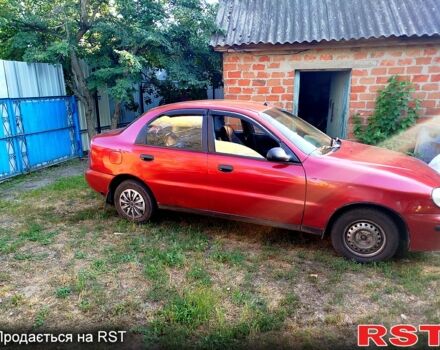 Красный Дэу Ланос, объемом двигателя 1.4 л и пробегом 250 тыс. км за 2500 $, фото 1 на Automoto.ua