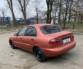 Красный Дэу Ланос, объемом двигателя 1.5 л и пробегом 258 тыс. км за 1750 $, фото 7 на Automoto.ua