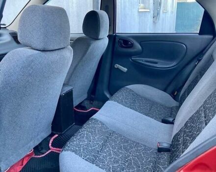 Красный Дэу Ланос, объемом двигателя 1.4 л и пробегом 103 тыс. км за 2700 $, фото 7 на Automoto.ua