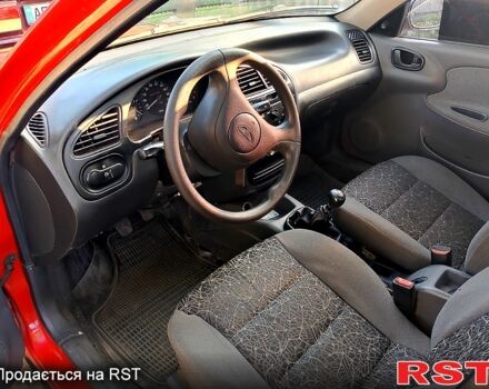 Красный Дэу Ланос, объемом двигателя 1.5 л и пробегом 0 тыс. км за 1700 $, фото 3 на Automoto.ua