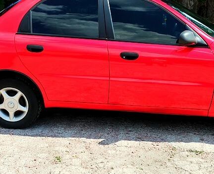 Красный Дэу Ланос, объемом двигателя 1.5 л и пробегом 250 тыс. км за 2550 $, фото 3 на Automoto.ua