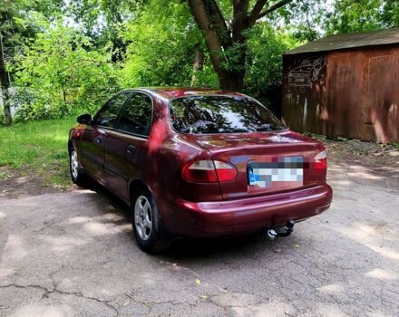 Красный Дэу Ланос, объемом двигателя 1.5 л и пробегом 213 тыс. км за 3000 $, фото 1 на Automoto.ua