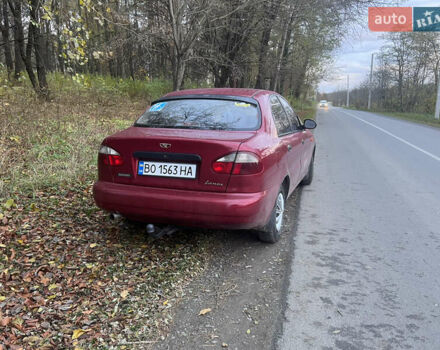Красный Дэу Ланос, объемом двигателя 1.5 л и пробегом 205 тыс. км за 2200 $, фото 1 на Automoto.ua