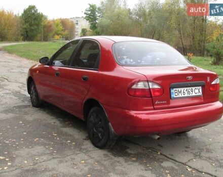 Красный Дэу Ланос, объемом двигателя 1.5 л и пробегом 204 тыс. км за 3100 $, фото 4 на Automoto.ua
