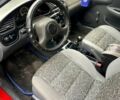 Красный Дэу Ланос, объемом двигателя 1.4 л и пробегом 129 тыс. км за 2200 $, фото 11 на Automoto.ua